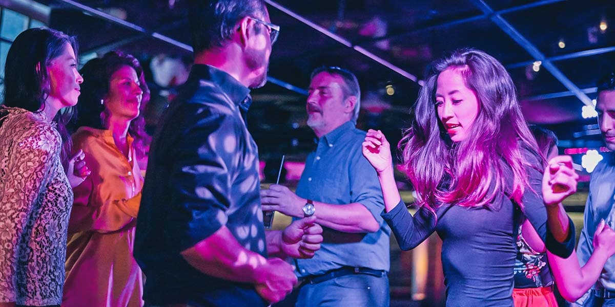 Group dancing in Columbus Club on Newcastle-Amsterdam