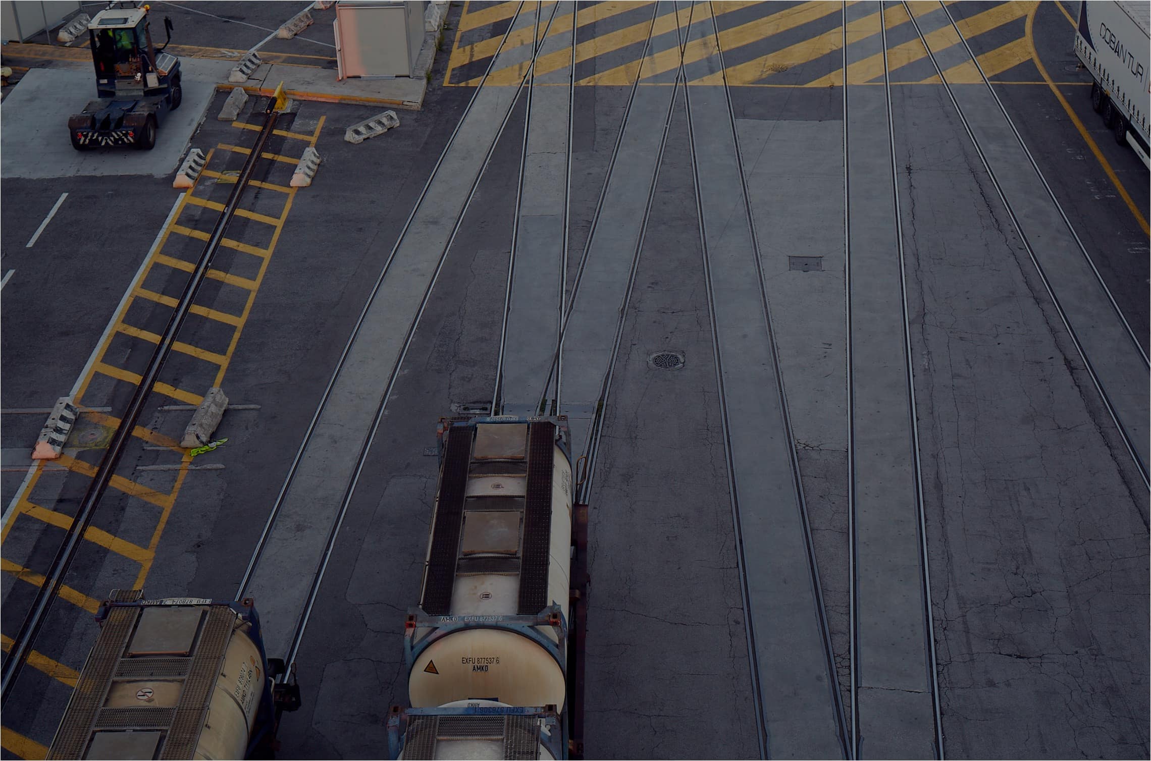 Aerial shot of cargo on rail transport at DFDS Trieste terminal.