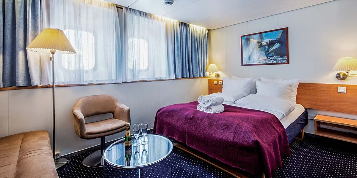 Commodore cabin onboard Newcastle-Amsterdam
