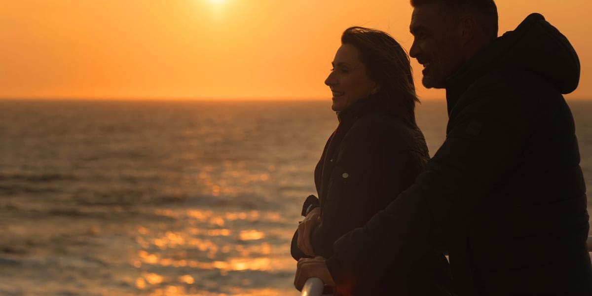 Couple looking at the sunset - Jersey