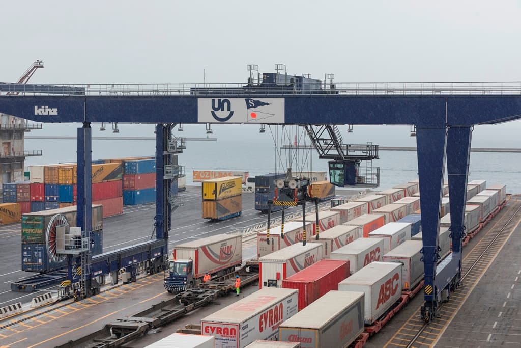 Trucks and shipping containers at DFDS' terminal in Trieste