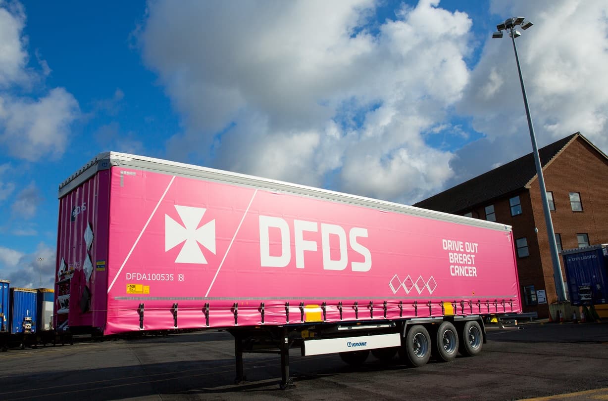 DFDS Logistics pink trailer in a shipyard