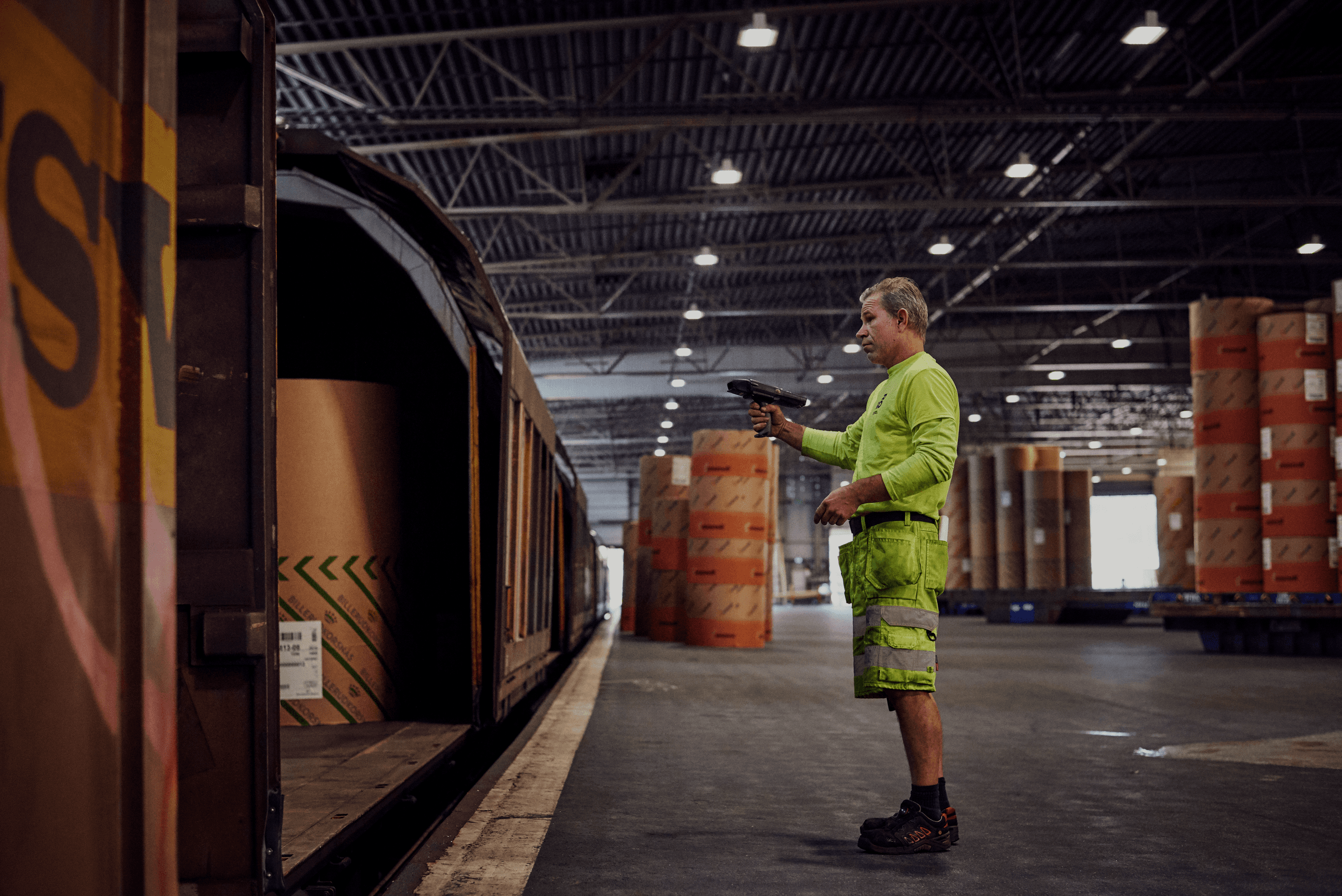 working man scanning cargo