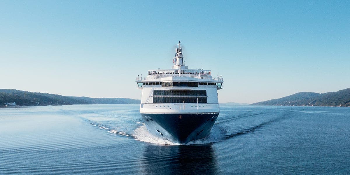 DFDS vessel ferry sailing at sea, as seen in front