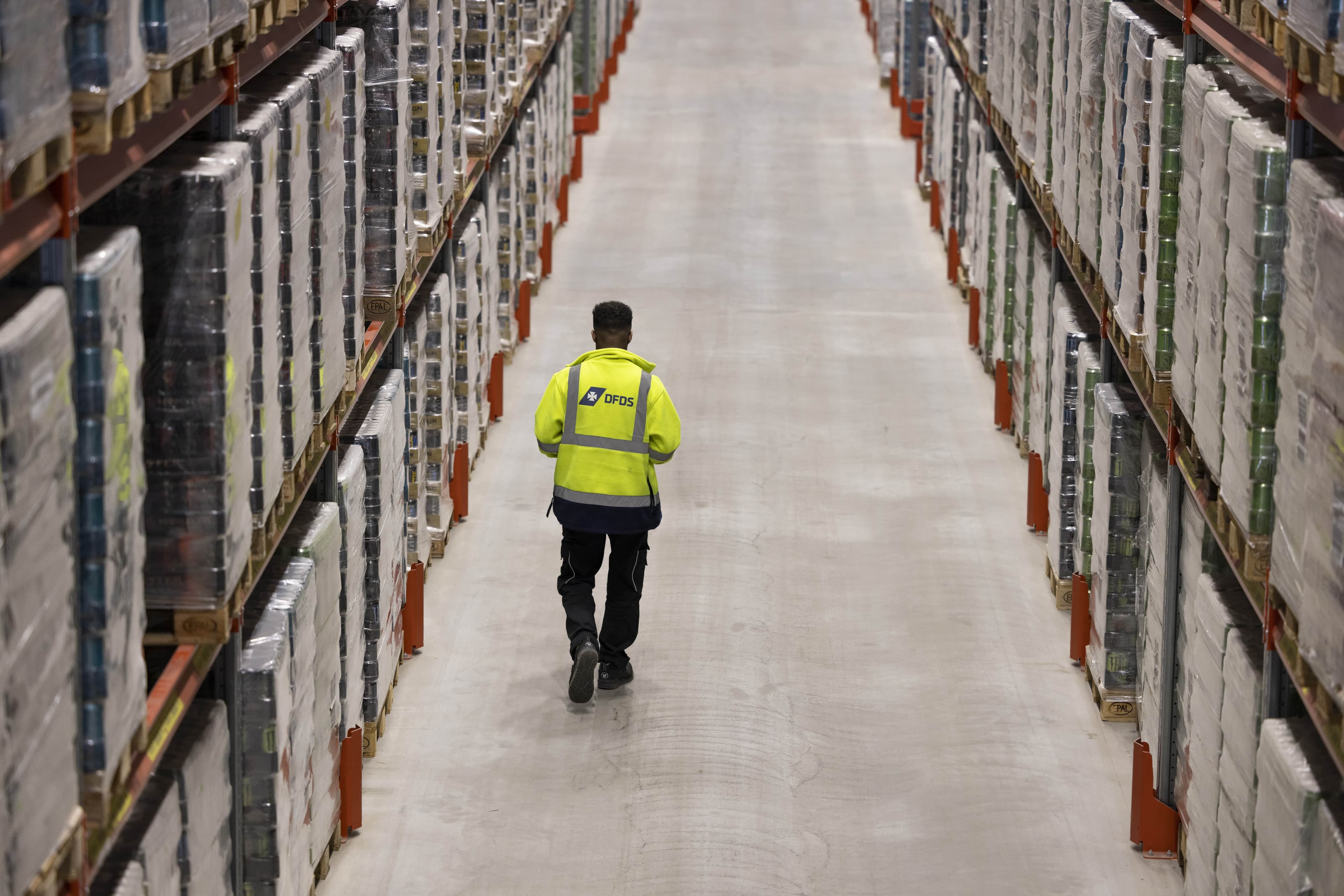 DFDS employee in a warehouse walking
