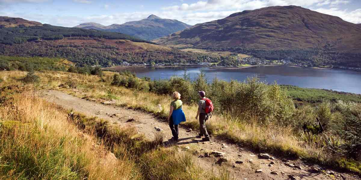 Couple walking in Scotland