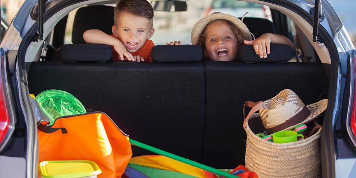 Kids happy to be going to an amusement park