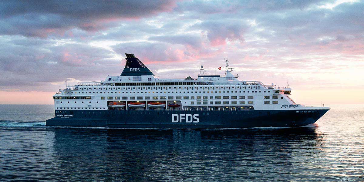 DFDS Pearl ship sailing at sunset
