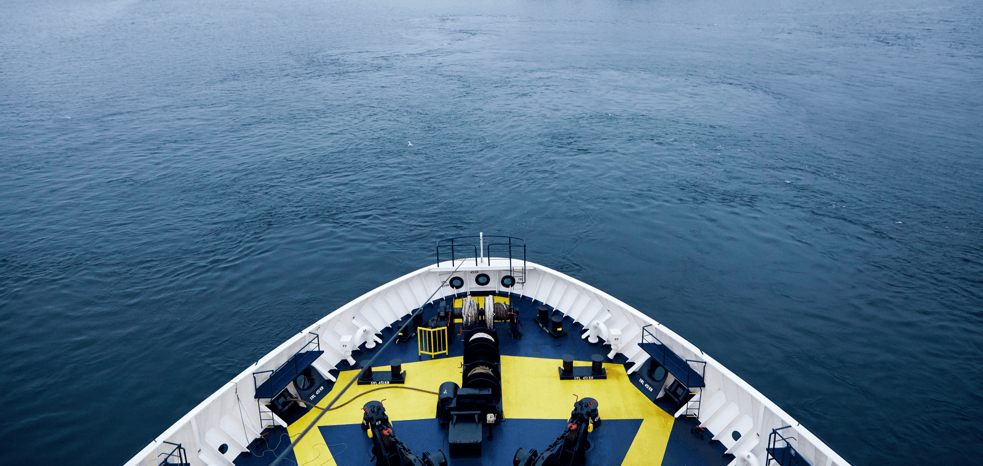 Ship at sea, freight ferry, aerial shot of ship