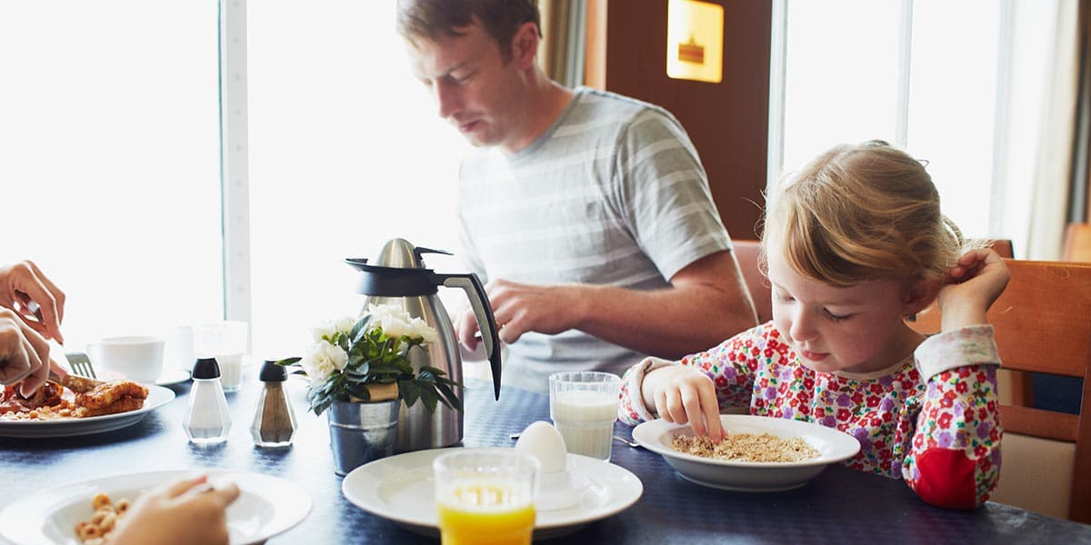 Family eating breakfast onboard ferry