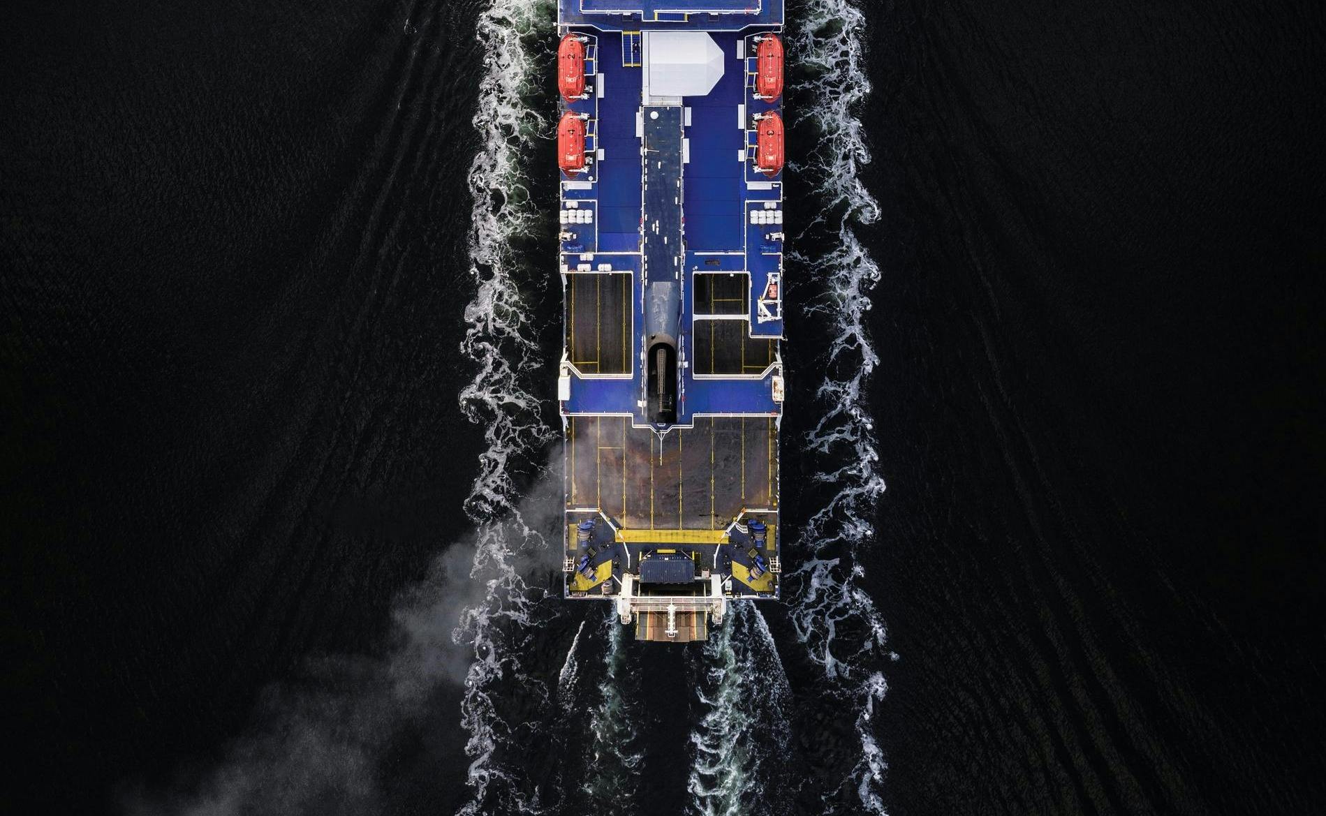 Aerial shot, ship sailing at sea