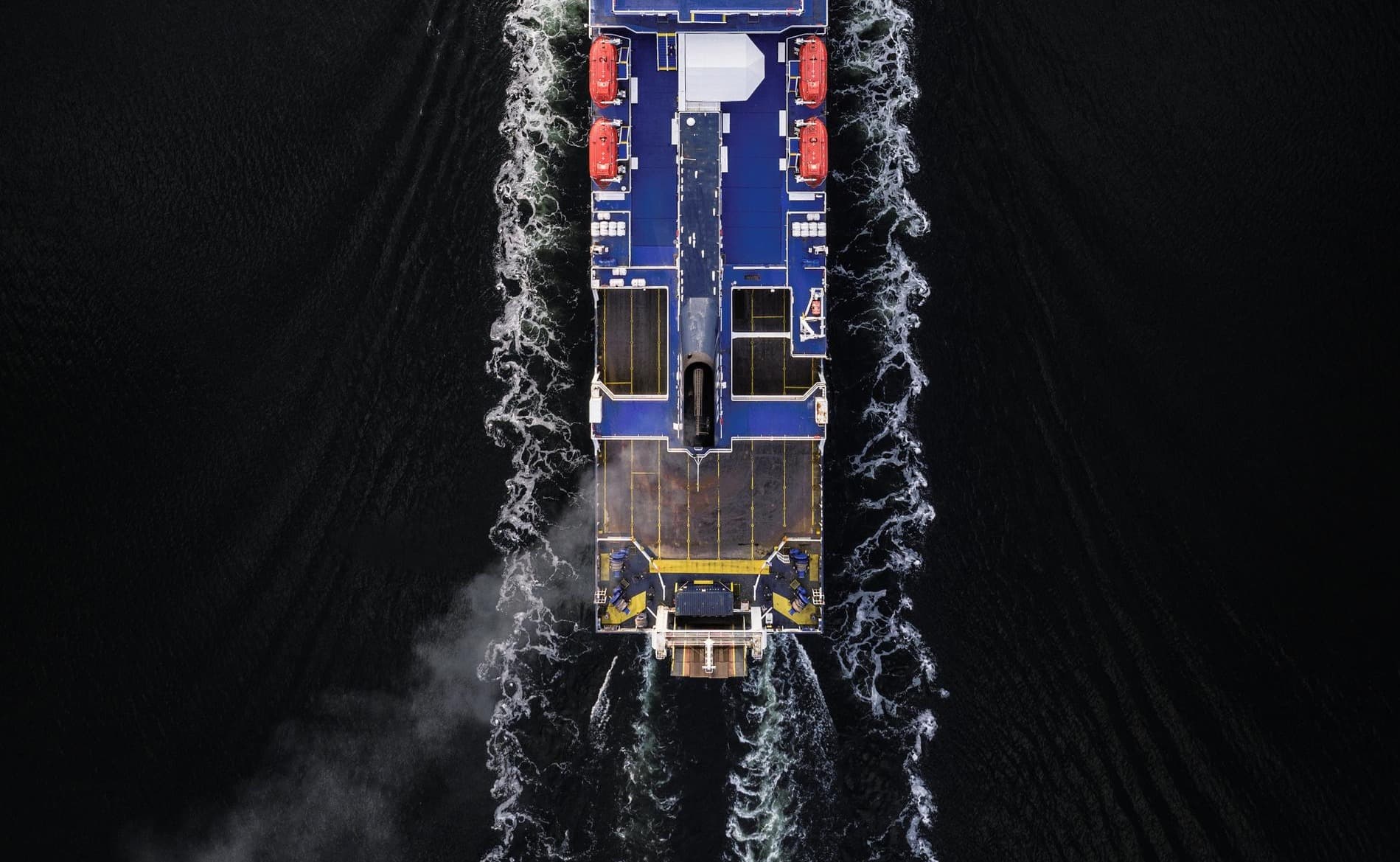 Aerial shot, ship sailing at sea