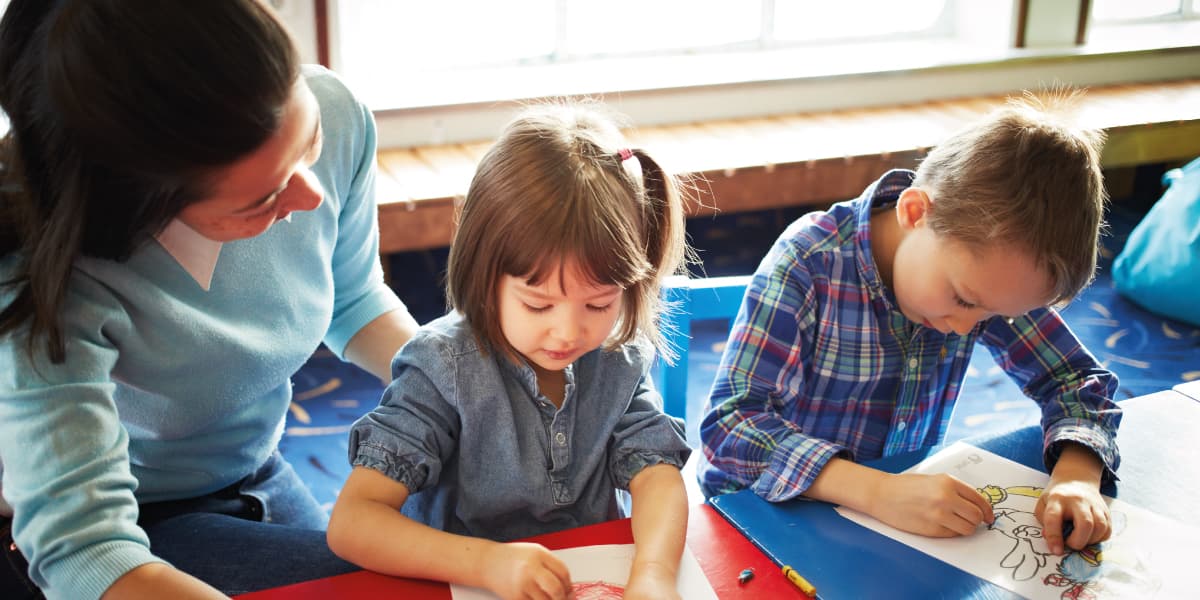 2 kids during drawing activity onboard our ferry