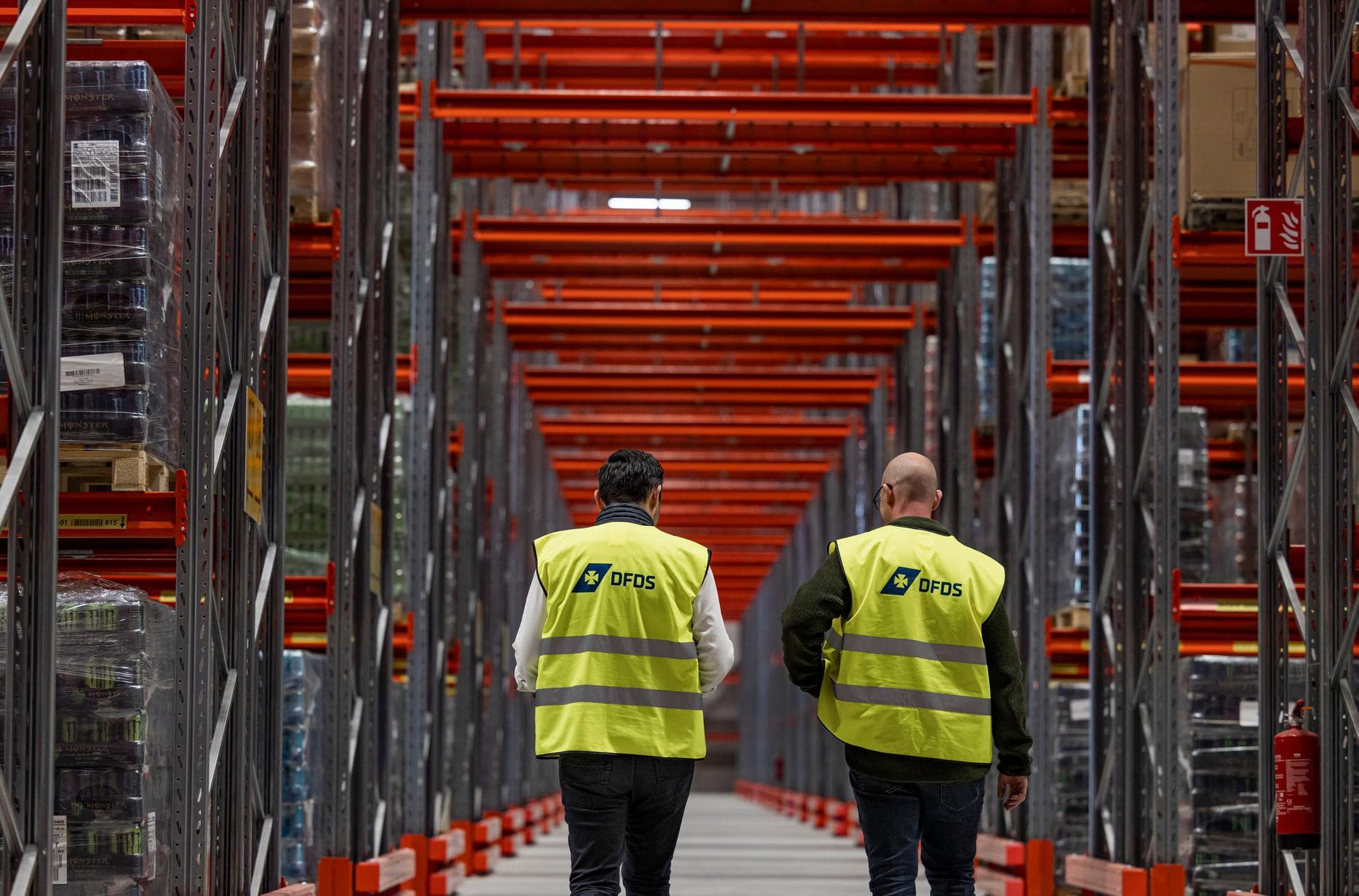 DFDS colleagues walking through a warehouse.