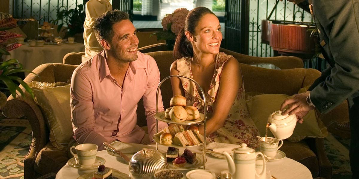 A couple celebrating Valentine's day with a British afternoon tea