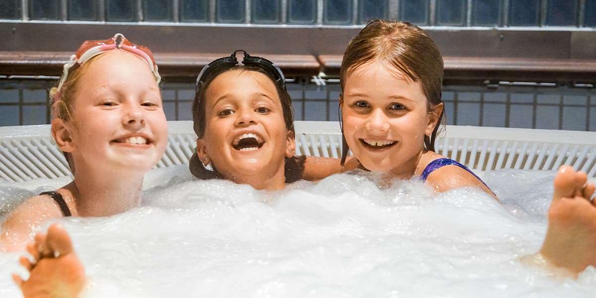 Family in the pool at the sundeck at Pearl Seaways