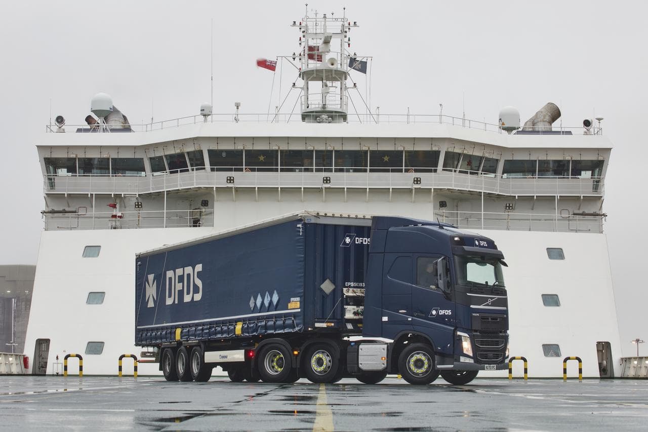 Truck in front of ship